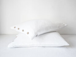 White linen pillowcases with buttons