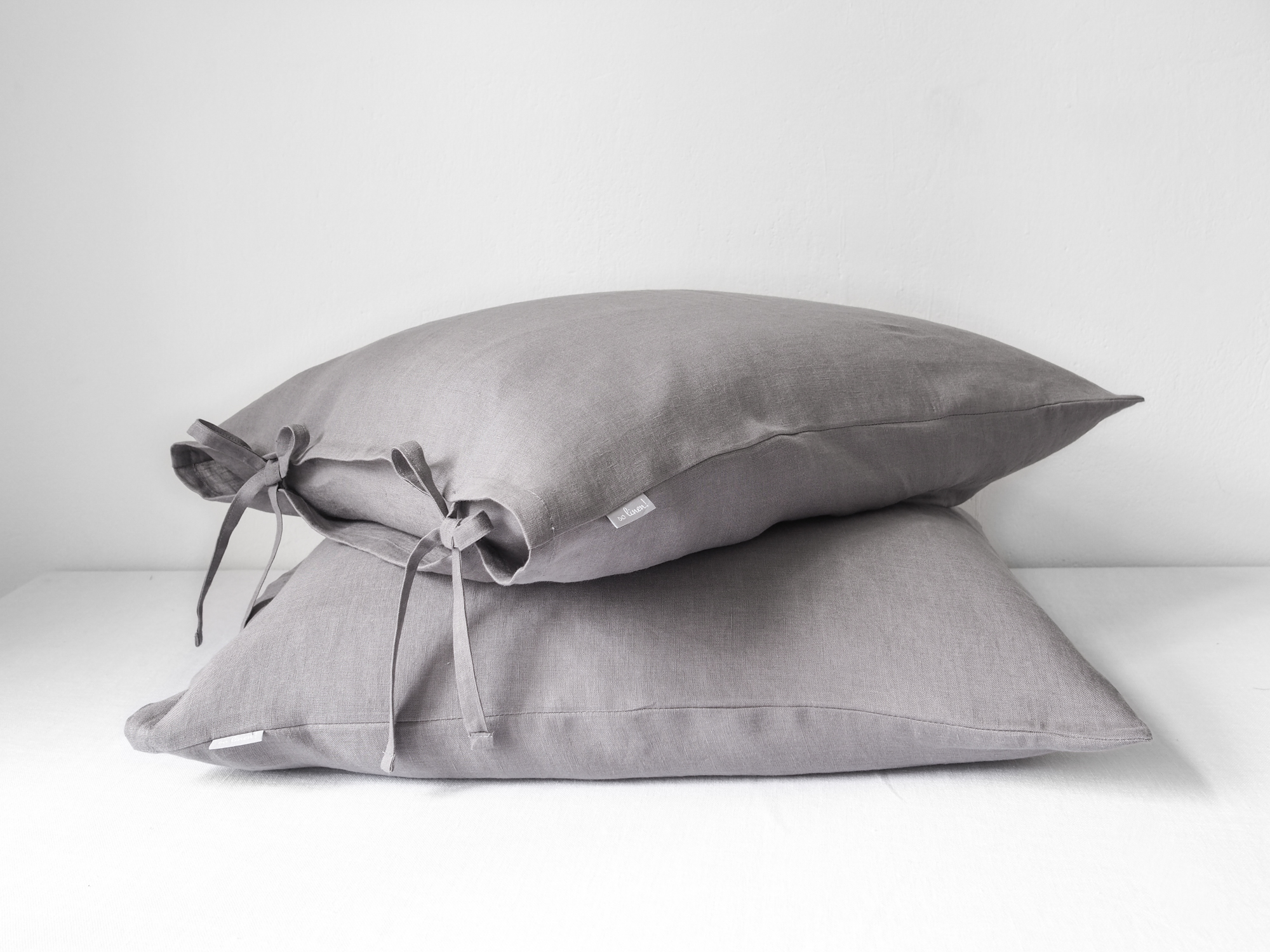 Grey linen pillowcases with ties