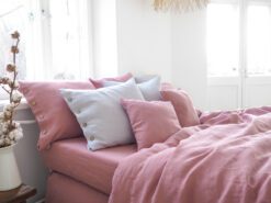 linen bedsheets in dusty pink