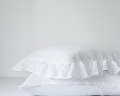 White linen ruffled pillow cases