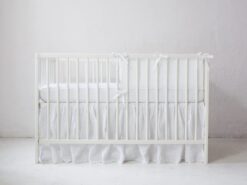 White linen crib bumper
