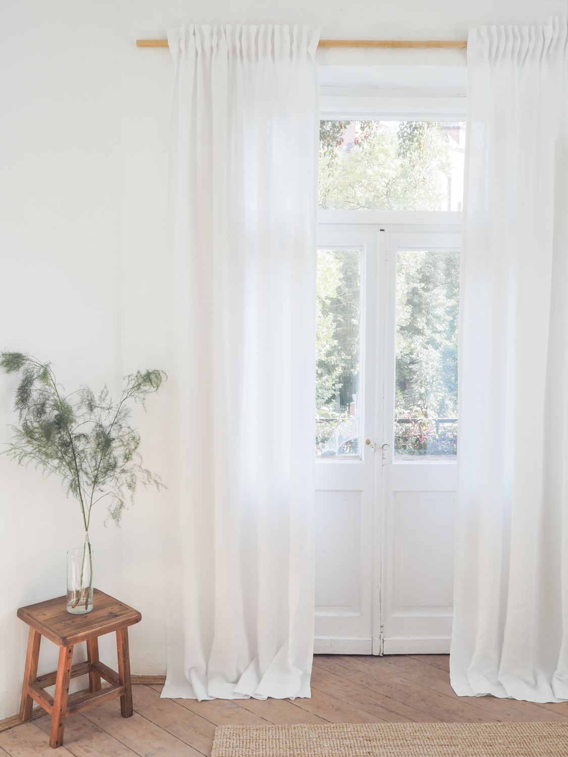 White darkening linen curtains with tape