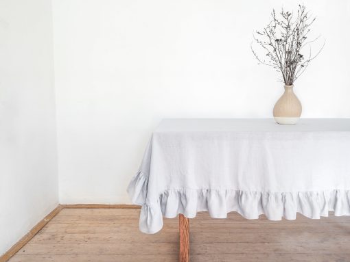 Light gray ruffled tablecloth