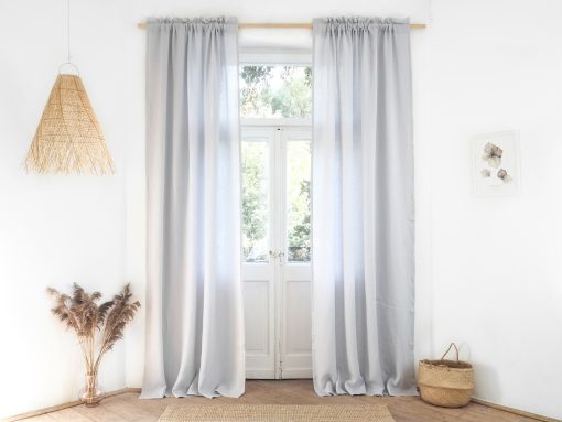 Light gray curtains with fringe