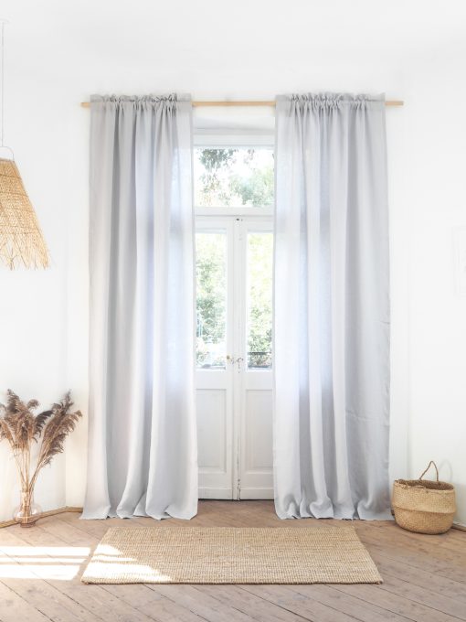 Light gray curtains with fringe