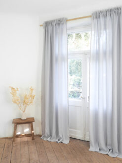 Light gray linen curtain panel with gathering tape