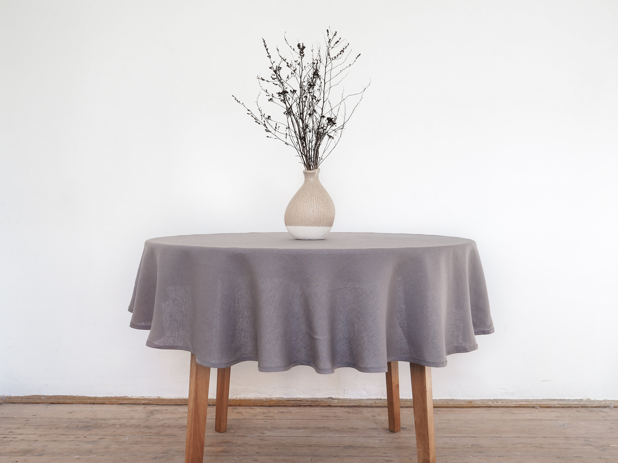 Light round linen tablecloth