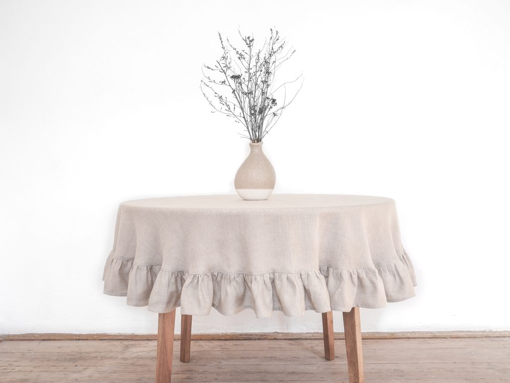 delicate round tablecloth with a frill
