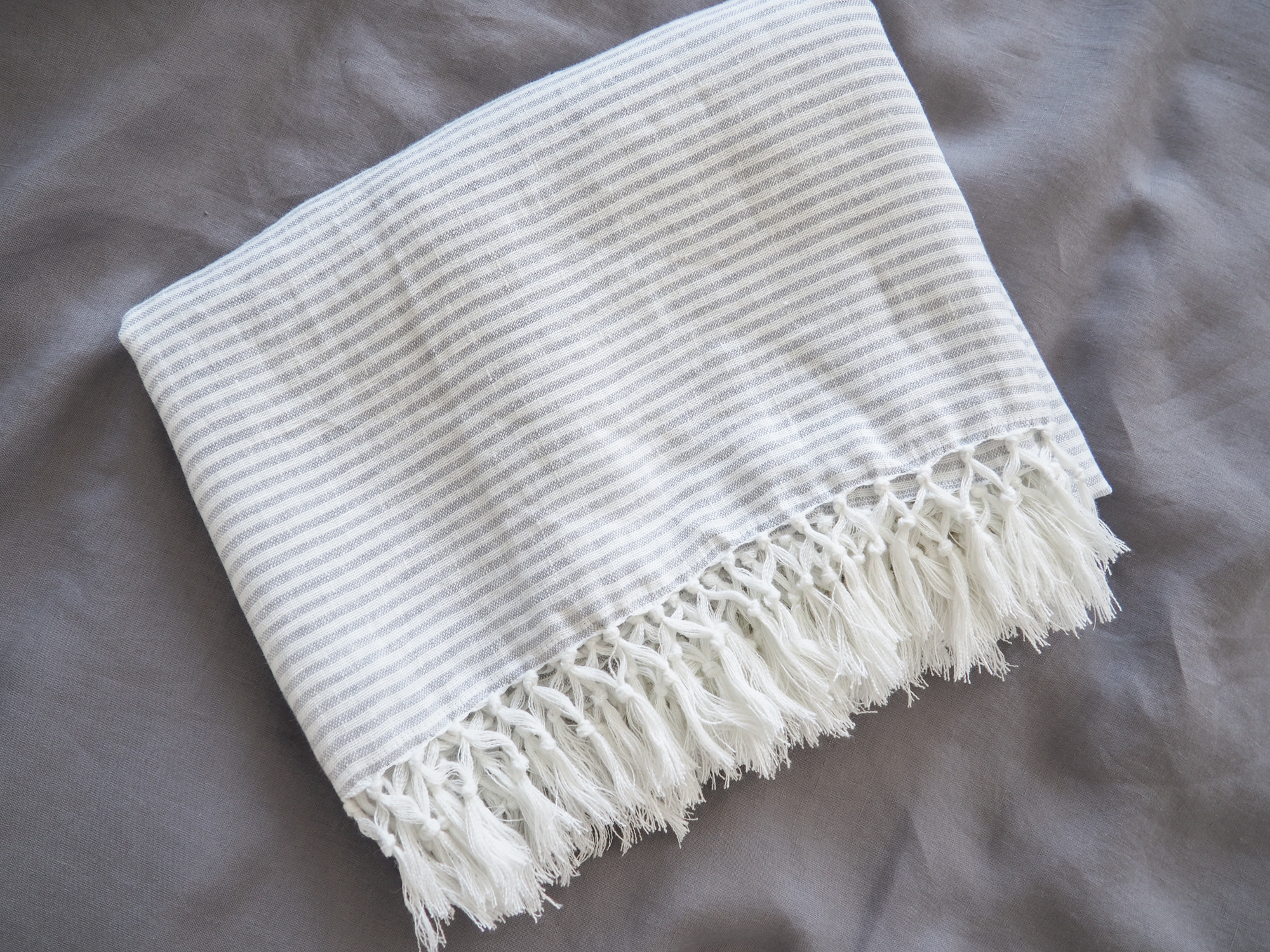 Striped linen blanket with fringe