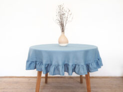 Delicate linen tablecloth with a frill