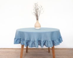 Delicate linen tablecloth with a frill