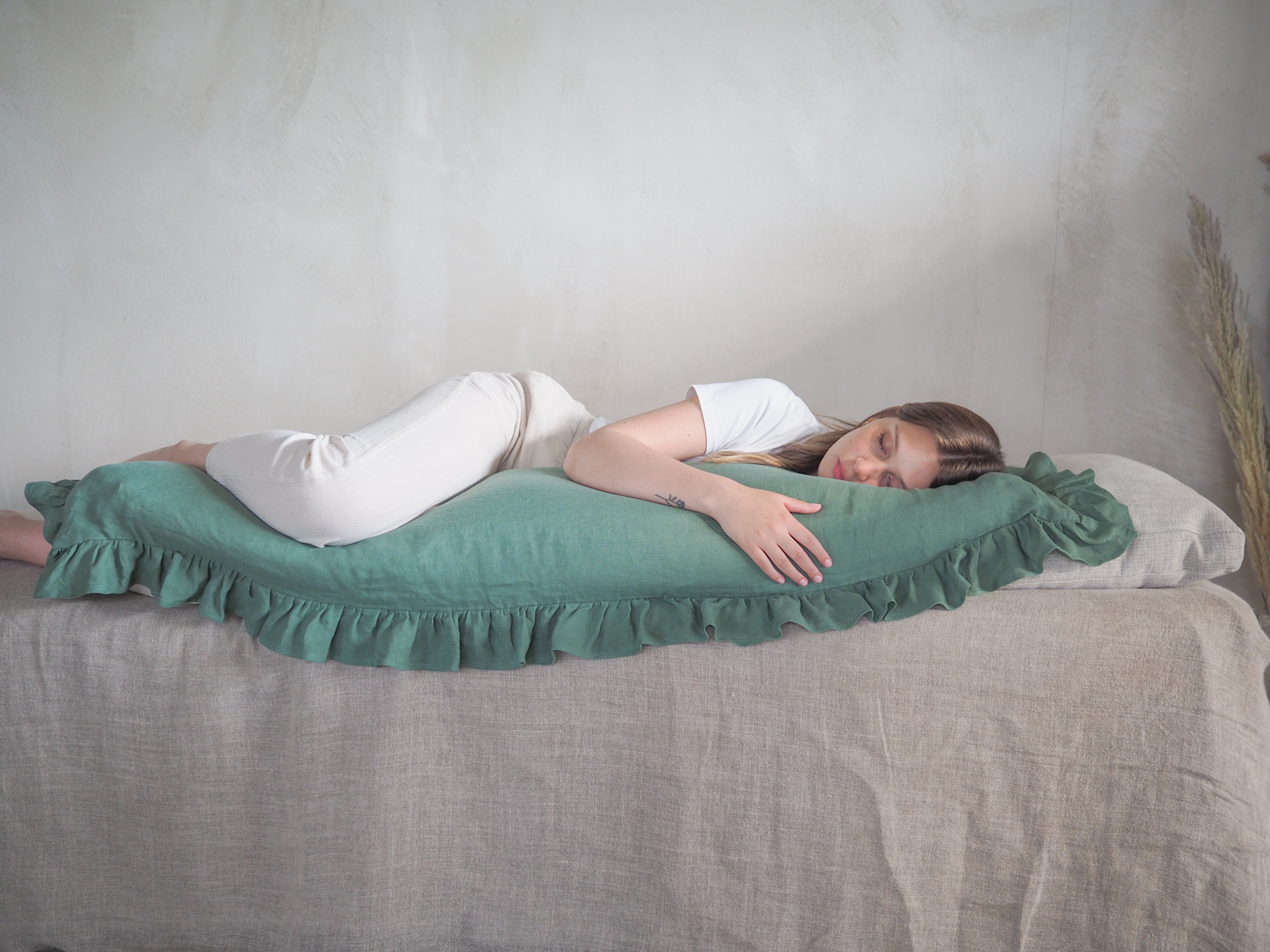 Green ruffled linen body pillow