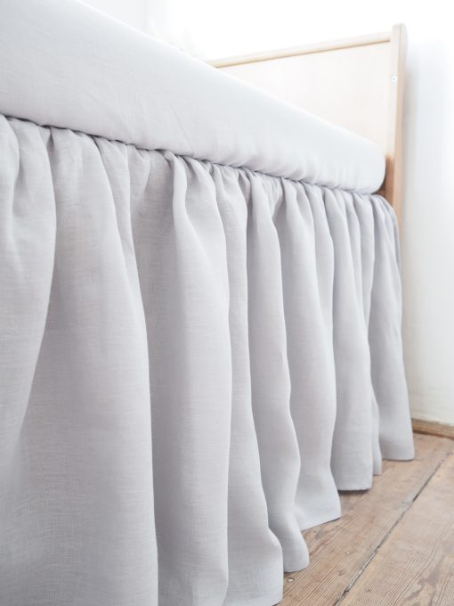 Light gray linen crib skirt