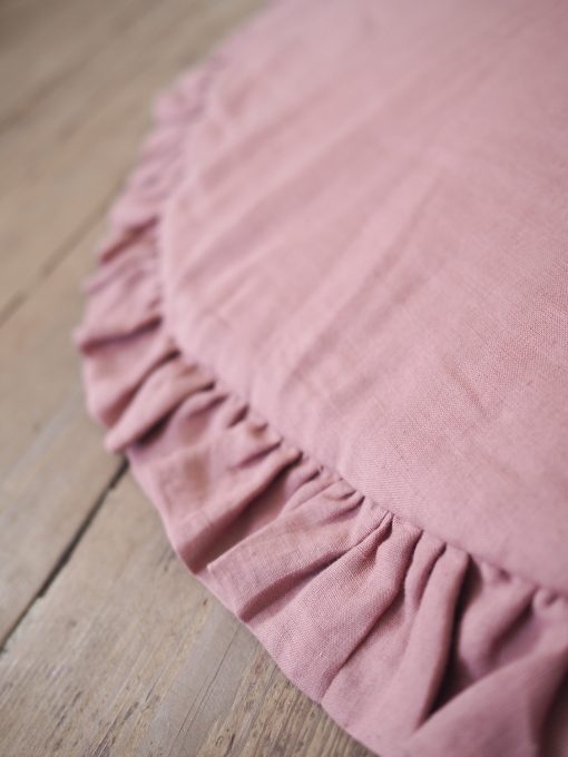 Pink play mat with a frill