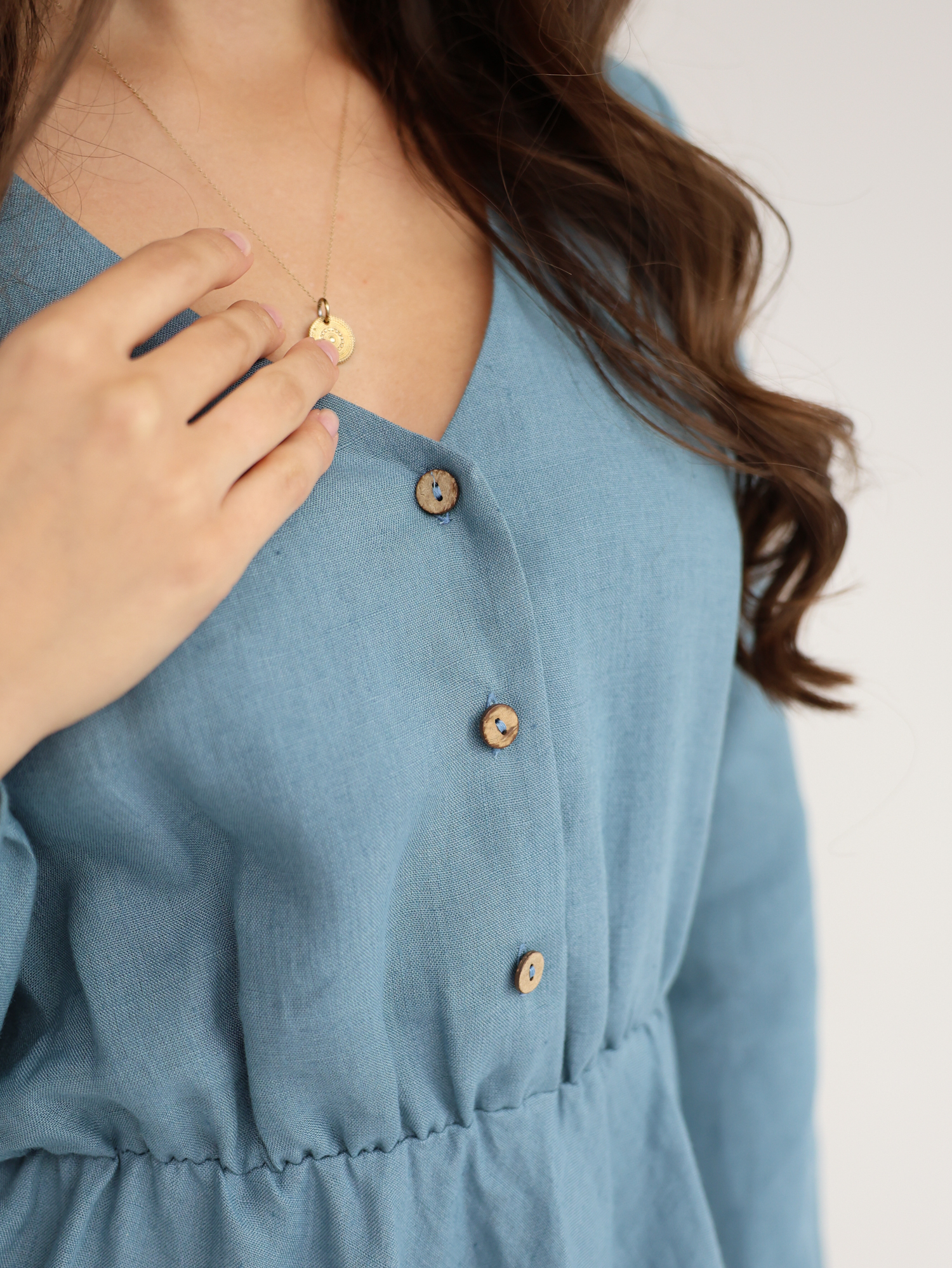 Blue linen dress with long sleeves